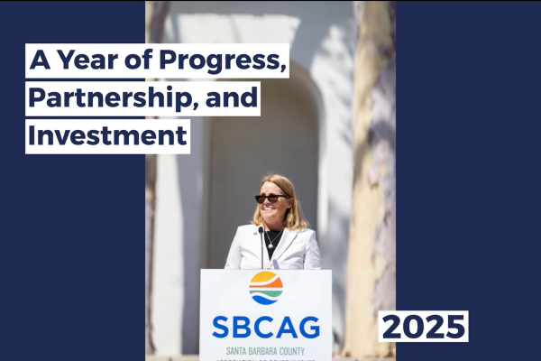 Executive Director Marjie Kirn stands at a podium with the SBCAG logo, speaking outdoors. Text on the image reads, “A Year of Progress, Partnership, and Investment” and “2025.”